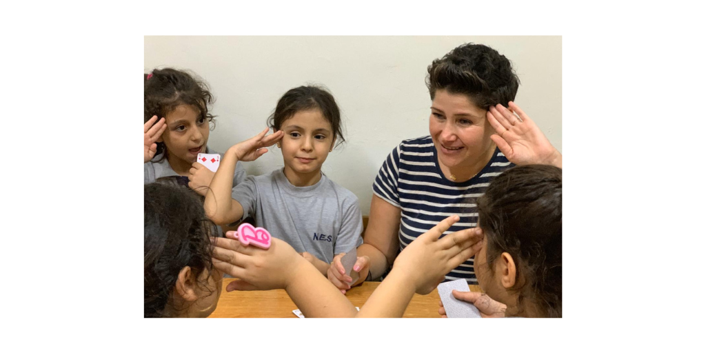 Teacher and children in Lebanon