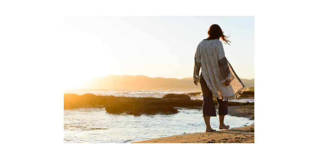 woman walking on beach